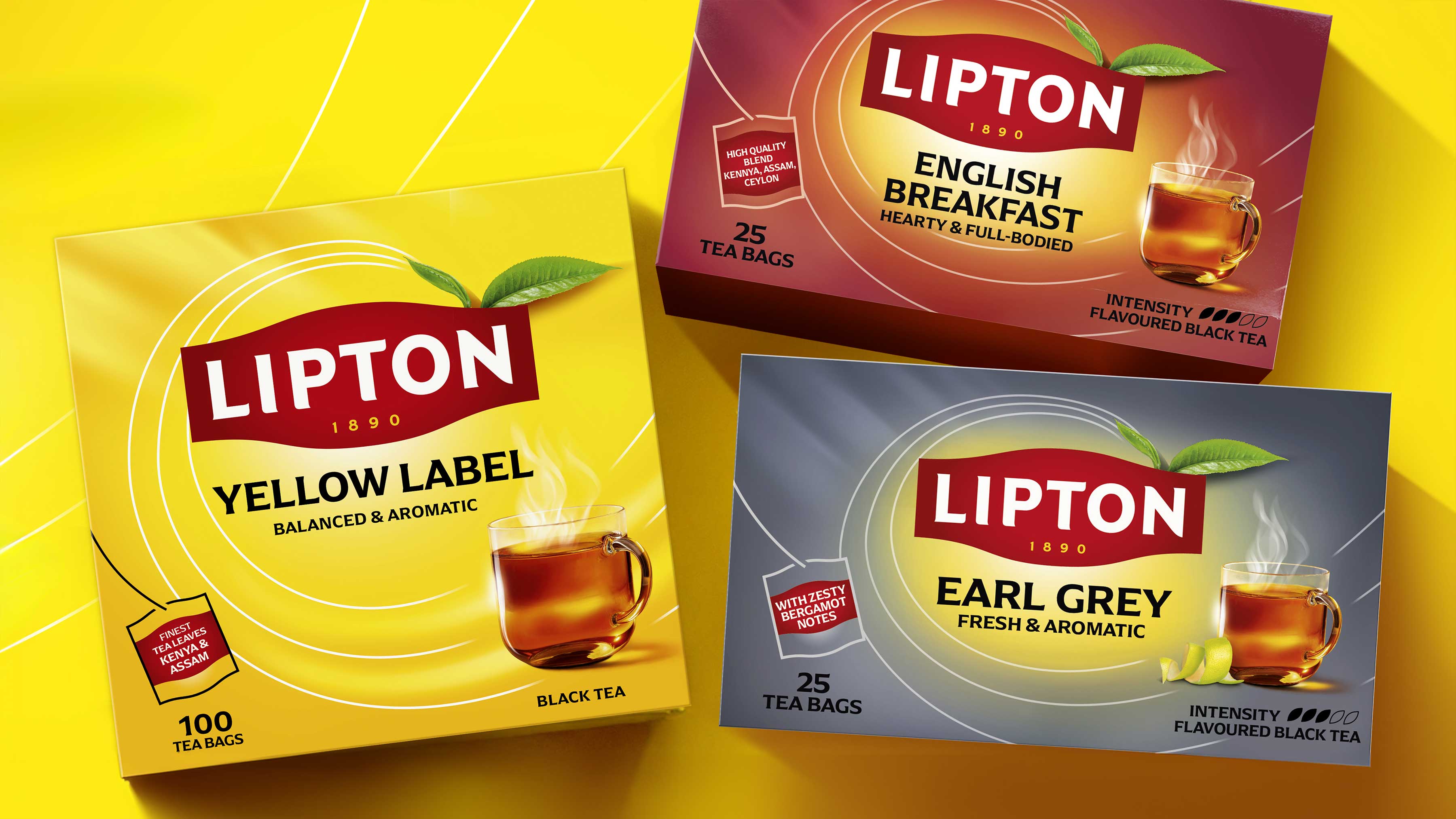 Three Lipton tea packages