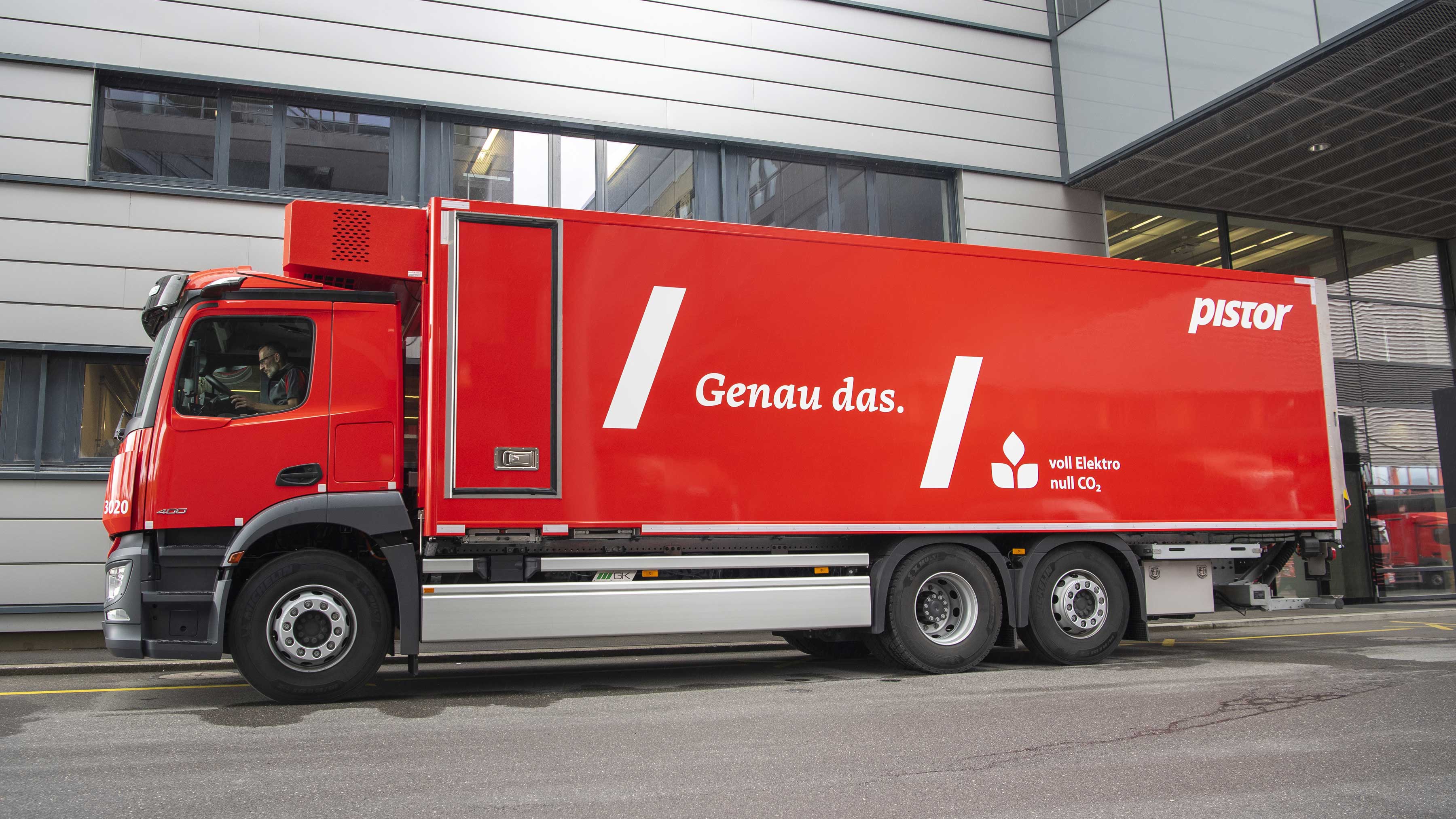 Red electric truck with the wordmark ‘Genau das.’ set in Tuna Italic and the Pistor logo