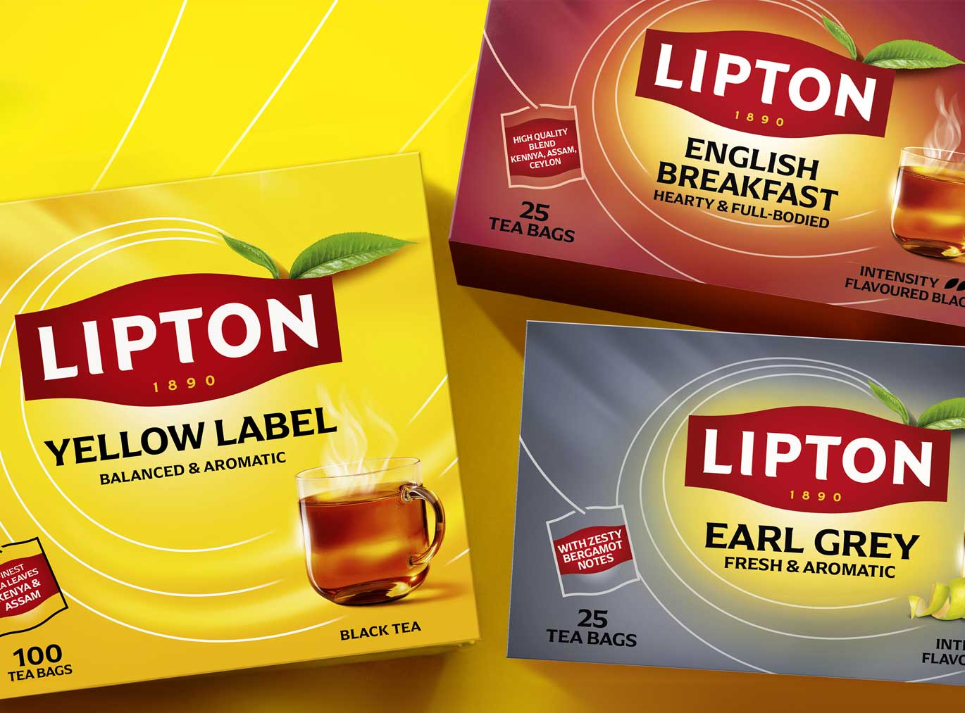 Three Lipton tea packages